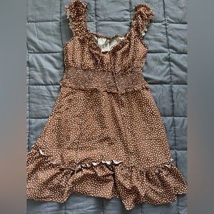 brown and white flowy dress